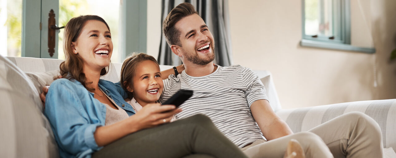 Happy Family Enjoying Comfort at Home