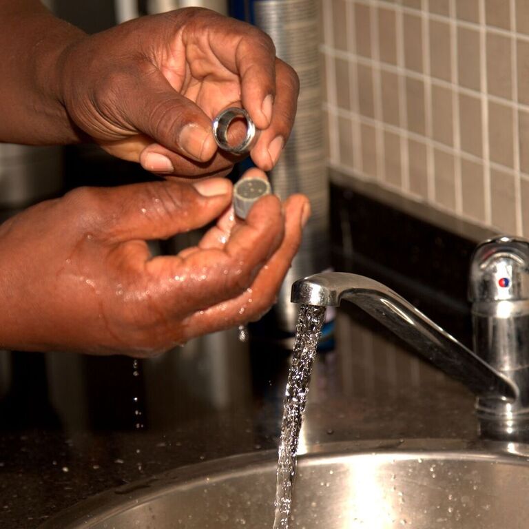 Cleaning a faucet – Alpha Plumbing