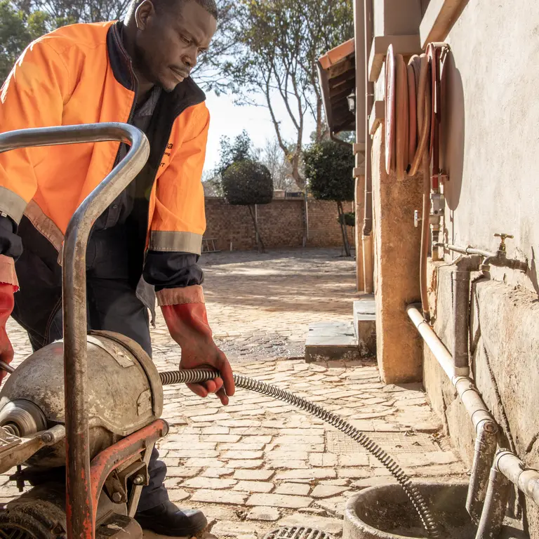 Alpha Plumbing technician on site