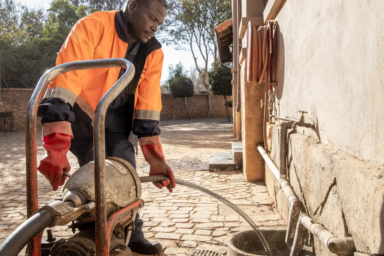 Alpha Plumbing technician on site
