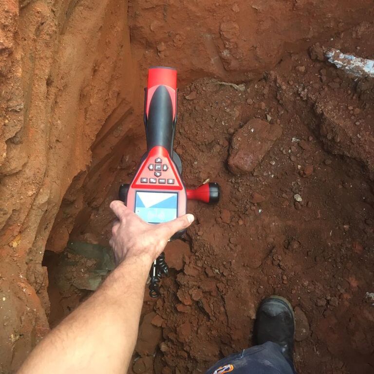 Measuring depth pinpointing position of sewer line