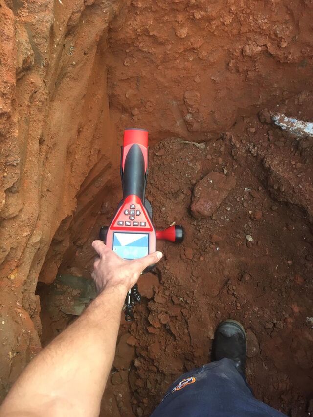 Measuring depth pinpointing position of sewer line