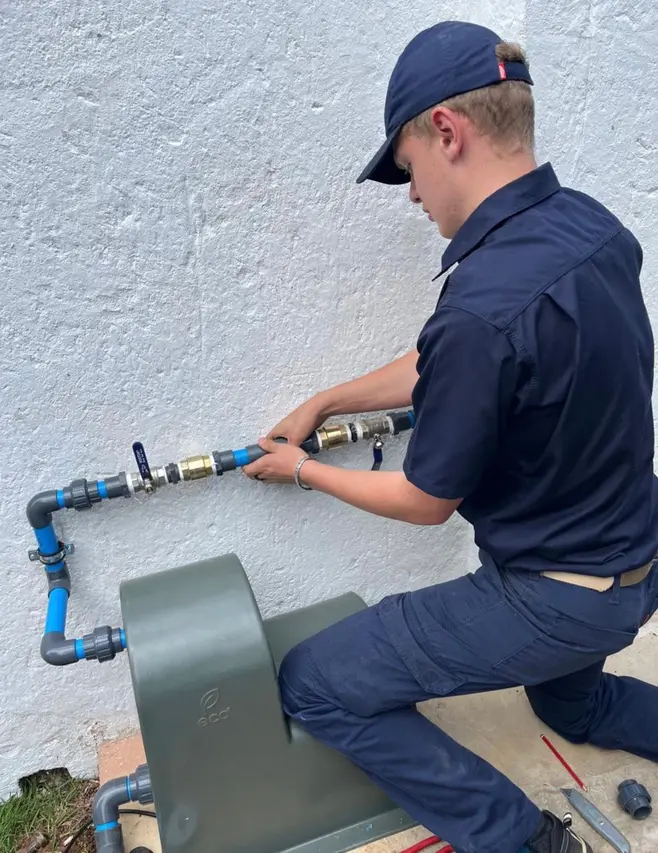 Stefan installing water pump system – Alpha Plumbing